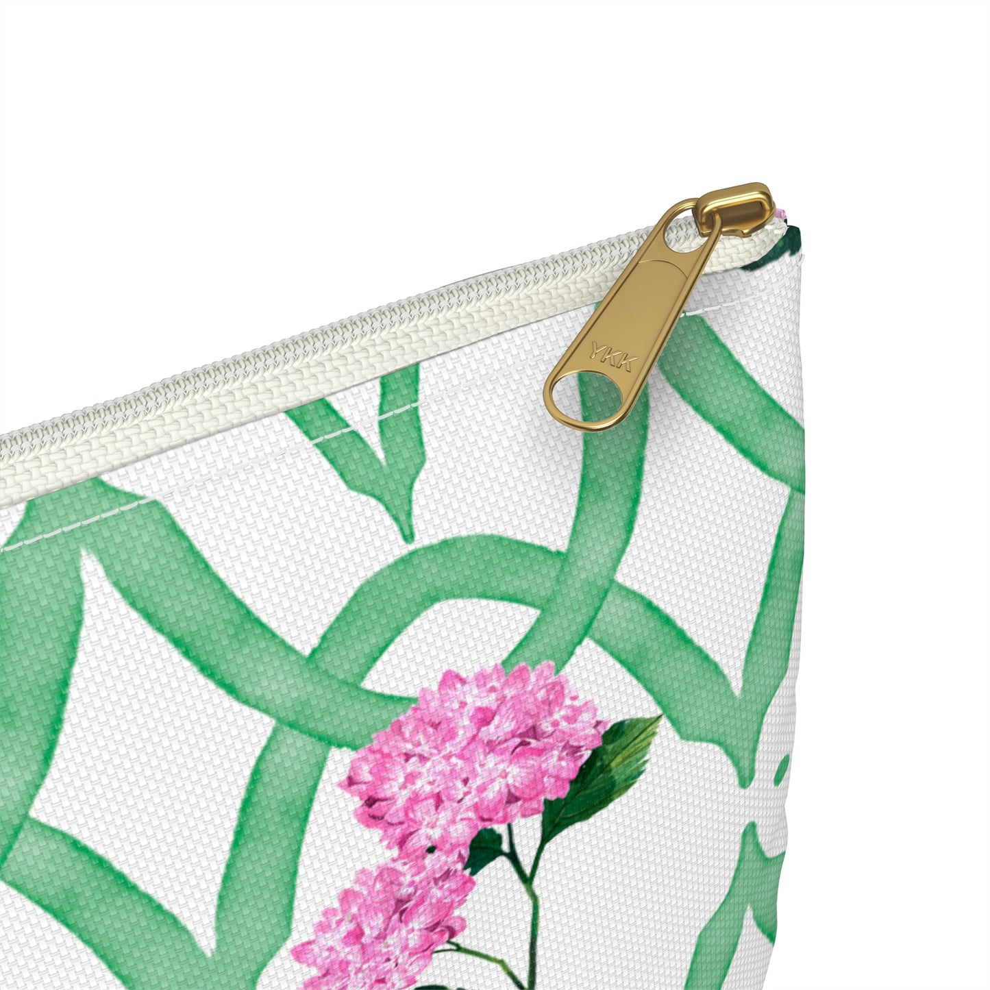 Close up image of gold zipper on pouch