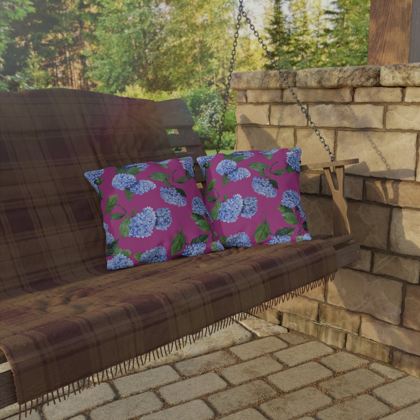 Hydrangea Patterned Outdoor Pillows in Peony on porch swing