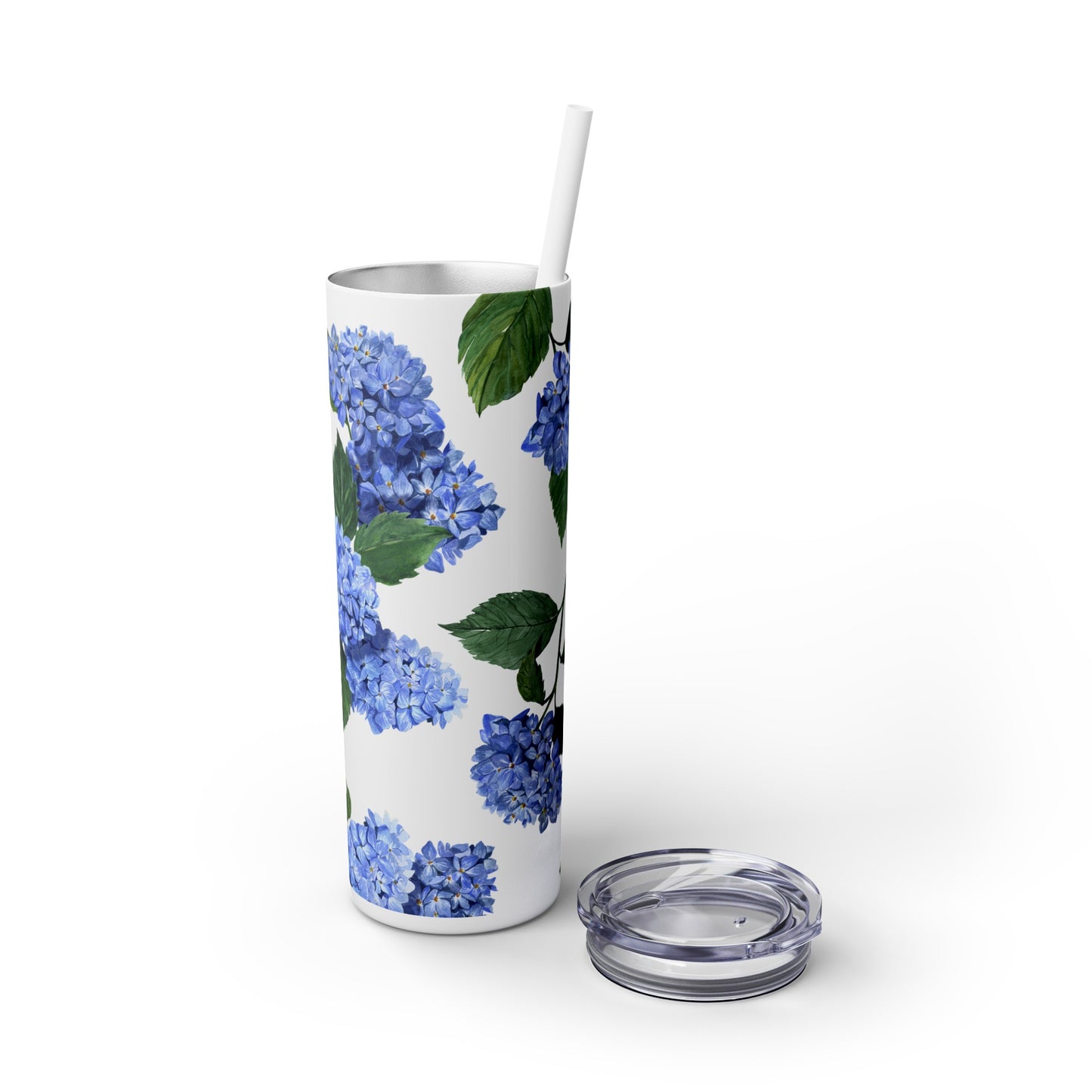 Hydrangea Tumbler with clear lid lying next to tumbler and white straw