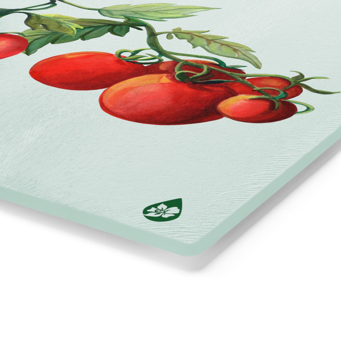 Zoomed corner view of Jersey Fresh Tomato tempered glass cutting board