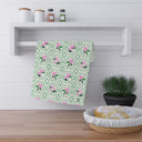 Garden Trellis Kitchen Towel hanging on kitchen towel rack in Tennis Grass Green Colorway