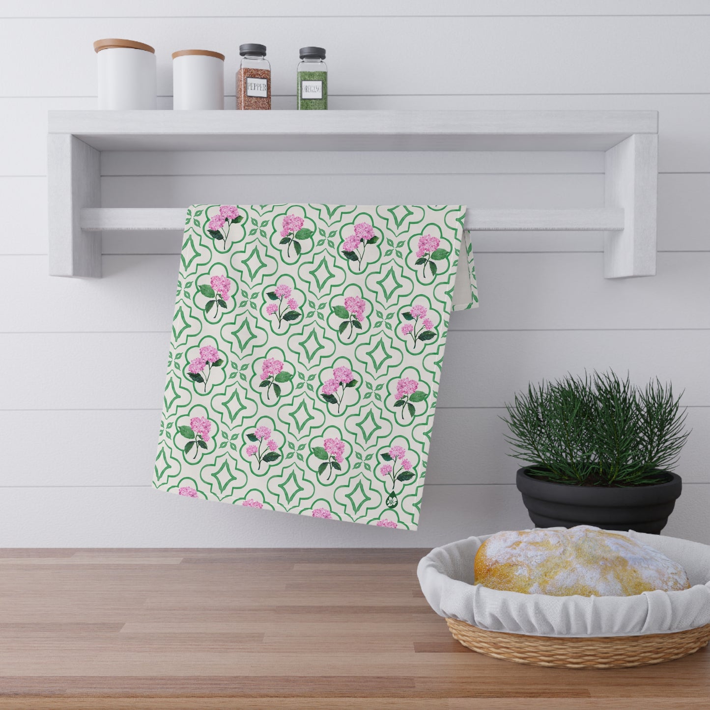 Garden Trellis Kitchen Towel hanging on kitchen towel rack in Tennis Grass Green Colorway