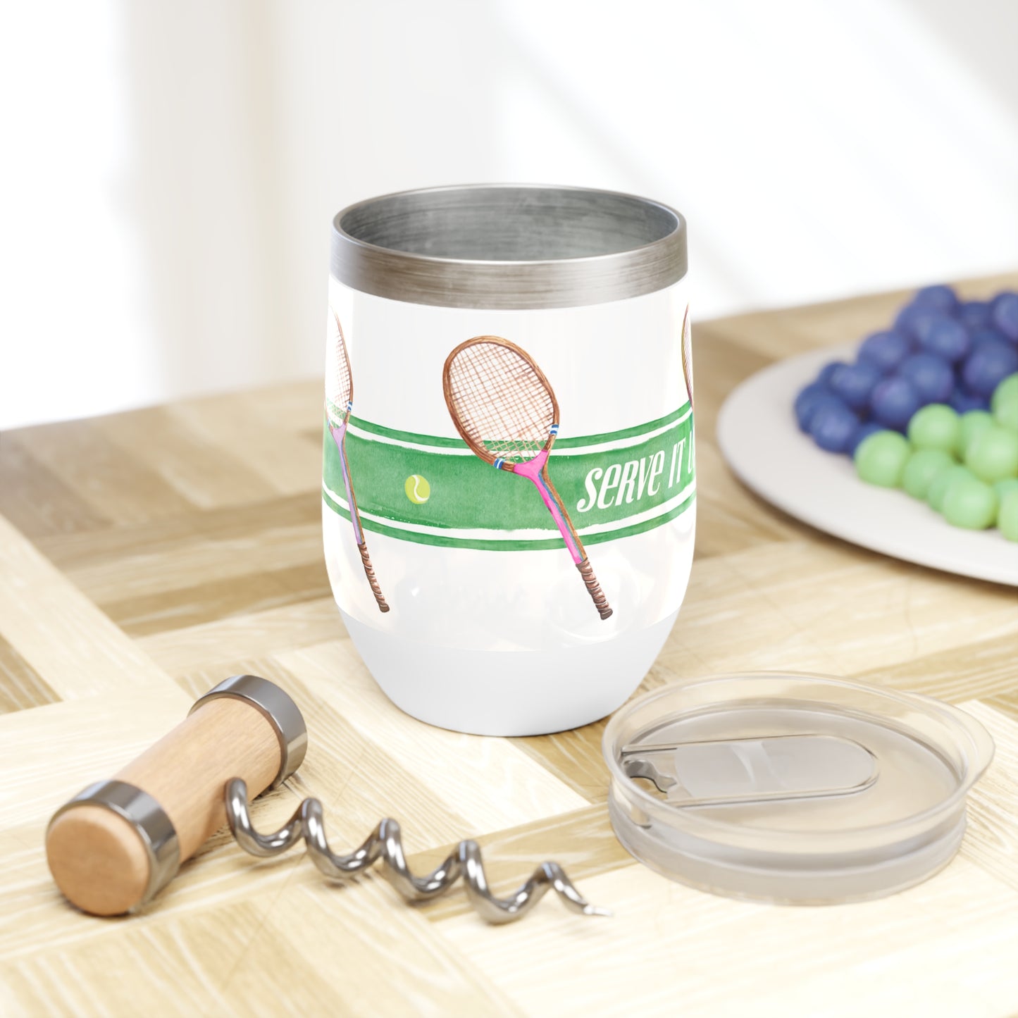 Stainless Steel Wine Tumbler and Illustrated with green stripe and tennis racquets with the phrase "Serve It Up"