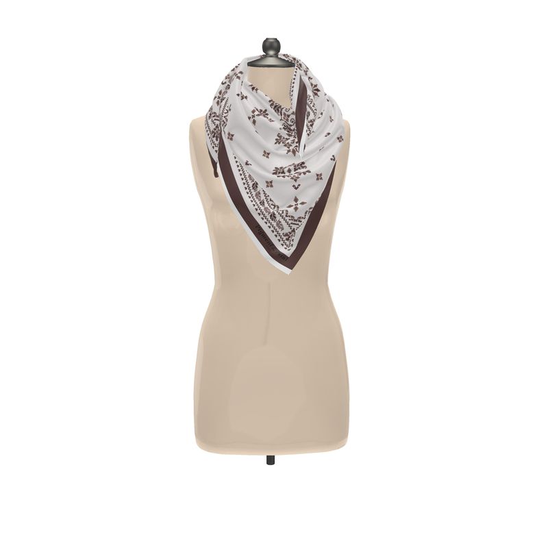 Apres Alpine Cream and Deep brown scarf draped around mannequins neck