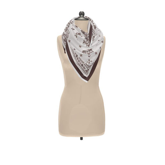 Apres Alpine Cream and Deep brown scarf draped around mannequins neck