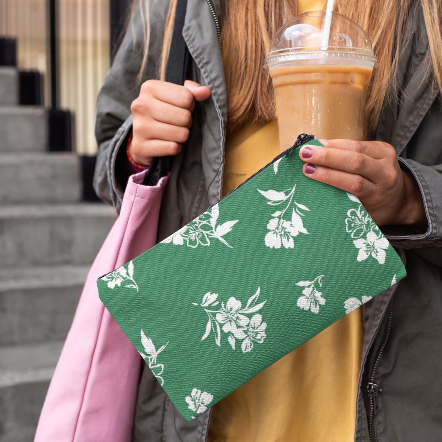 Woman holding Inky Floral Zip Pouch in Tennis Grass Green