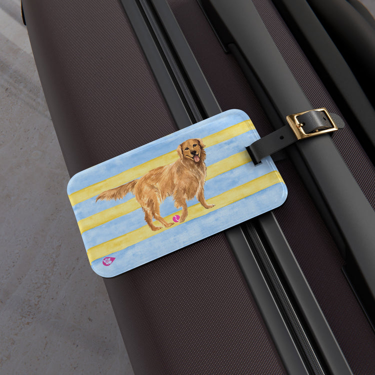 Pink, Green and White striped dish with Golden retriever dog in center with a tennis ball