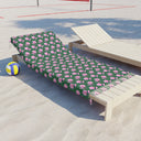 Side View of Watercolor Woodblock Beach Towel with Tassels on a beach lying across beach lounger by volleyball net in Tennis Grass Color Option