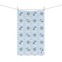 Garden Trellis Kitchen Towel hanging on clothes line in Cloudless Blue Colorway