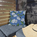 Hydrangea Patterned Outdoor Pillow in Cloudless on Porch Bench next to beach hat