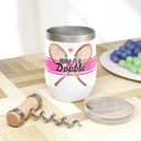 Stainless steel wine tumbler with pink stripe and tennis racquets with quote make it a double next to clear lid on wood cutting board with plate of grapes and wine opener