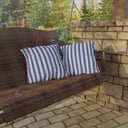 18x18 Outdoor Pillow in Cloudless Prep Stripe Pattern on edge of porch swing