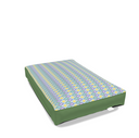 Side view of painted geo printed dog bed in cool color tones