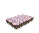 Side view of painted geo printed dog bed in warm color tones