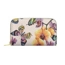 A zip-around wallet with a textured off-white background, decorated with a vibrant print of yellow orchids and colorful butterflies in pink, purple, green, and orange.